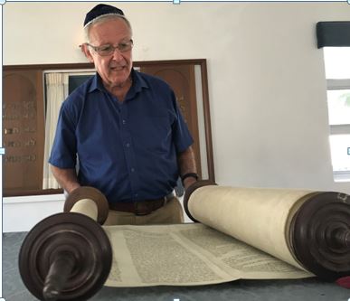 This is Rabbi Thomas Salaman of London opening the historic Scroll at Nidhe Israel Synagogue in Barbados 